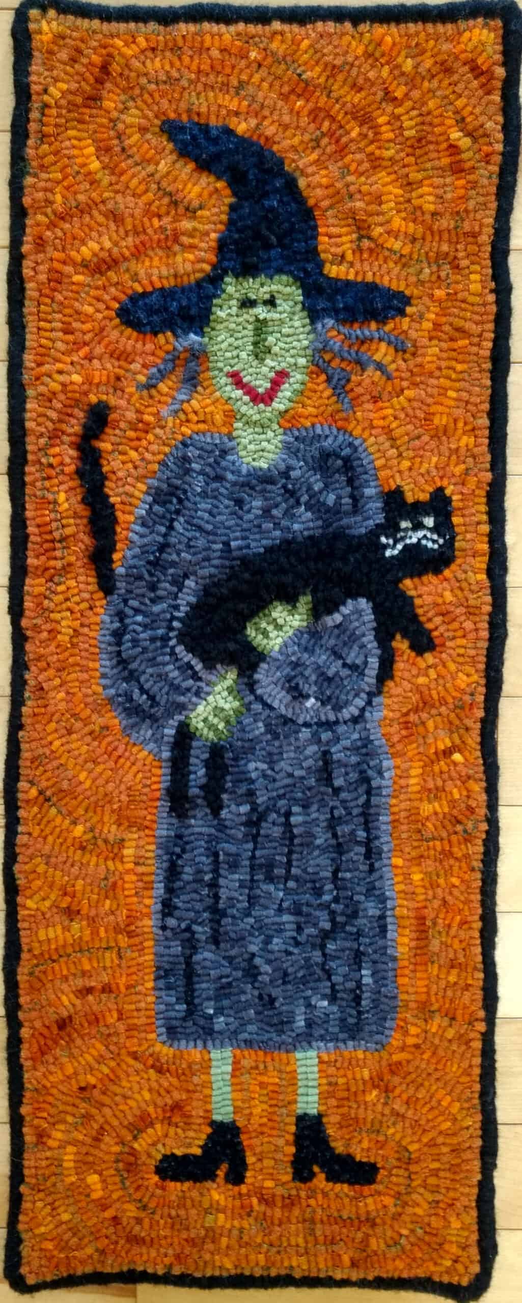 A Woolen Memories design hooked and photographed by Heather Fenz, St. Marys ON, completed in 2021, 9" x 25"