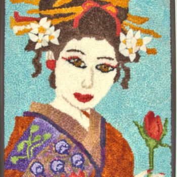 My Daughter Geisha, designed, hooked and photographed by Tatiana Knodel, Sudbury, ON. Mat is 9" x 12" and was completed in 2021.